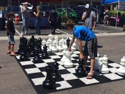 MegaChess 25 Inch Plastic Giant Chess Set with Commercial Grade Roll-Up Chessboard - UberSoccer